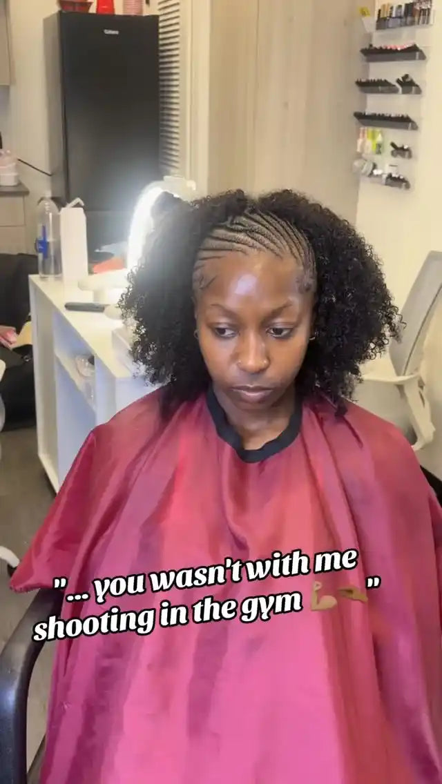 Long black boho braids with loose curls and scalp braid parting, hairstylist in Buffalo, NY