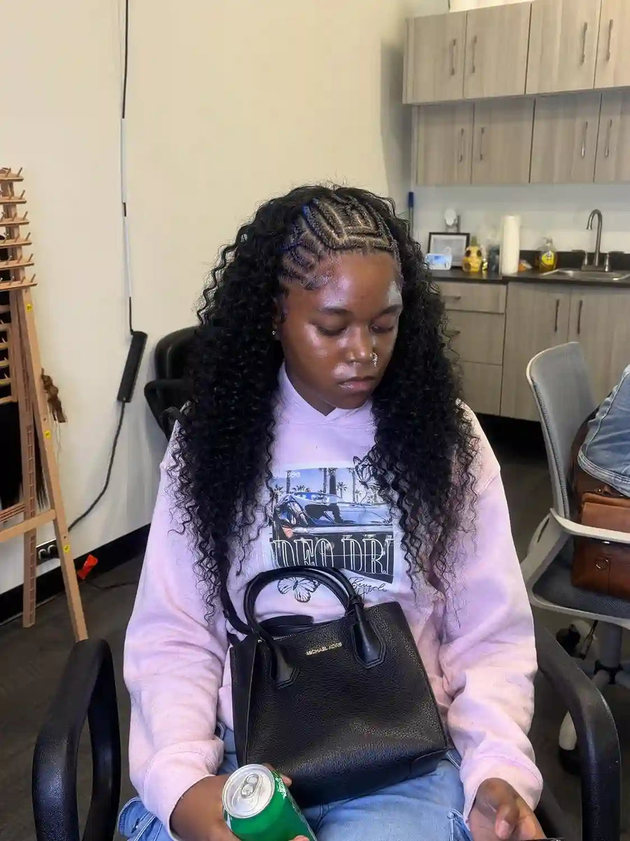 Medium island twists with loose curls and side part, hairstylist in Buffalo, NY