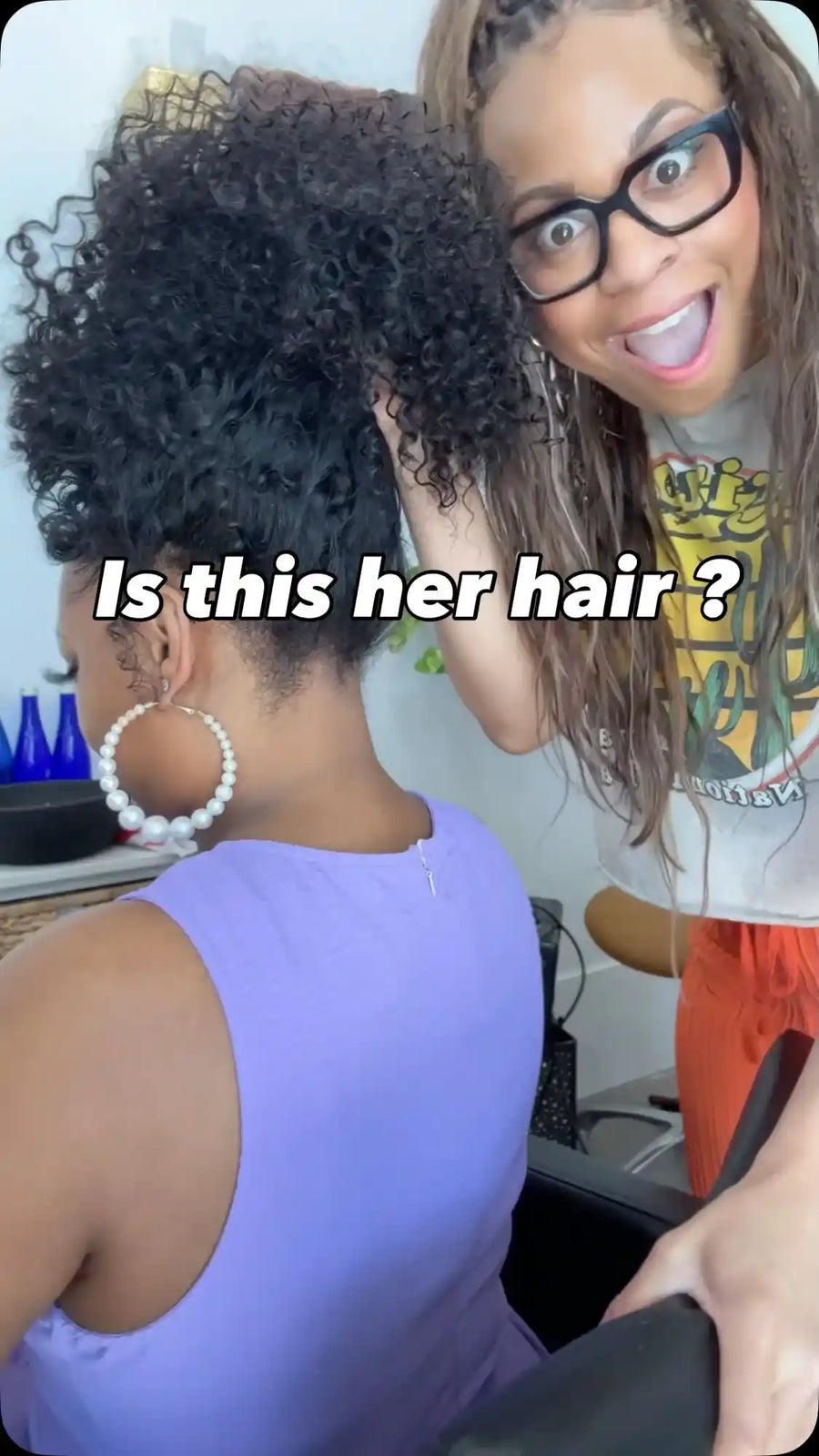 High natural curly puff updo with voluminous tight curls and a smooth tapered neckline, Stylist located in Gilbert, AZ