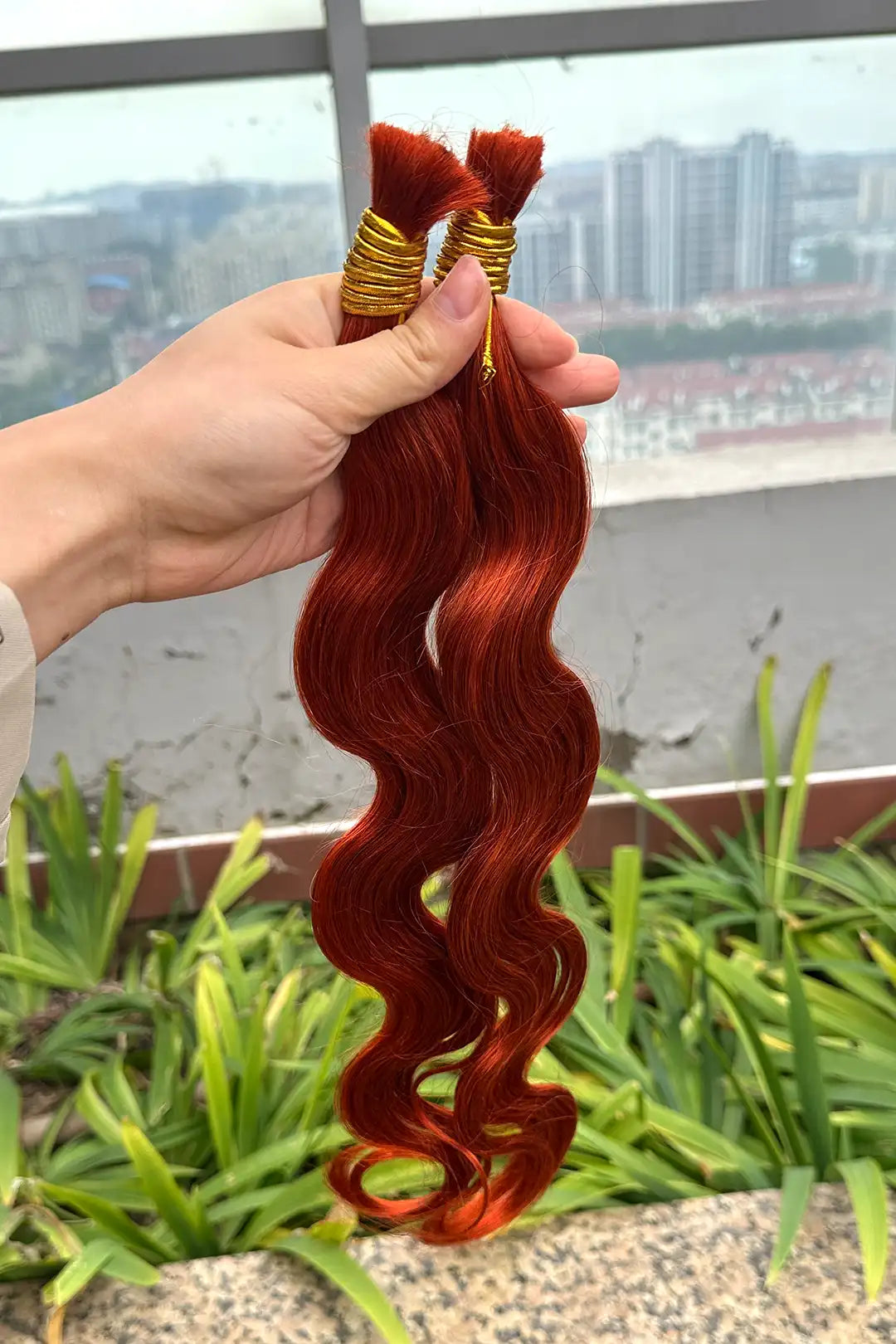 Outdoor picture of 350 ginger body wave bulk human hair for braiding bu24