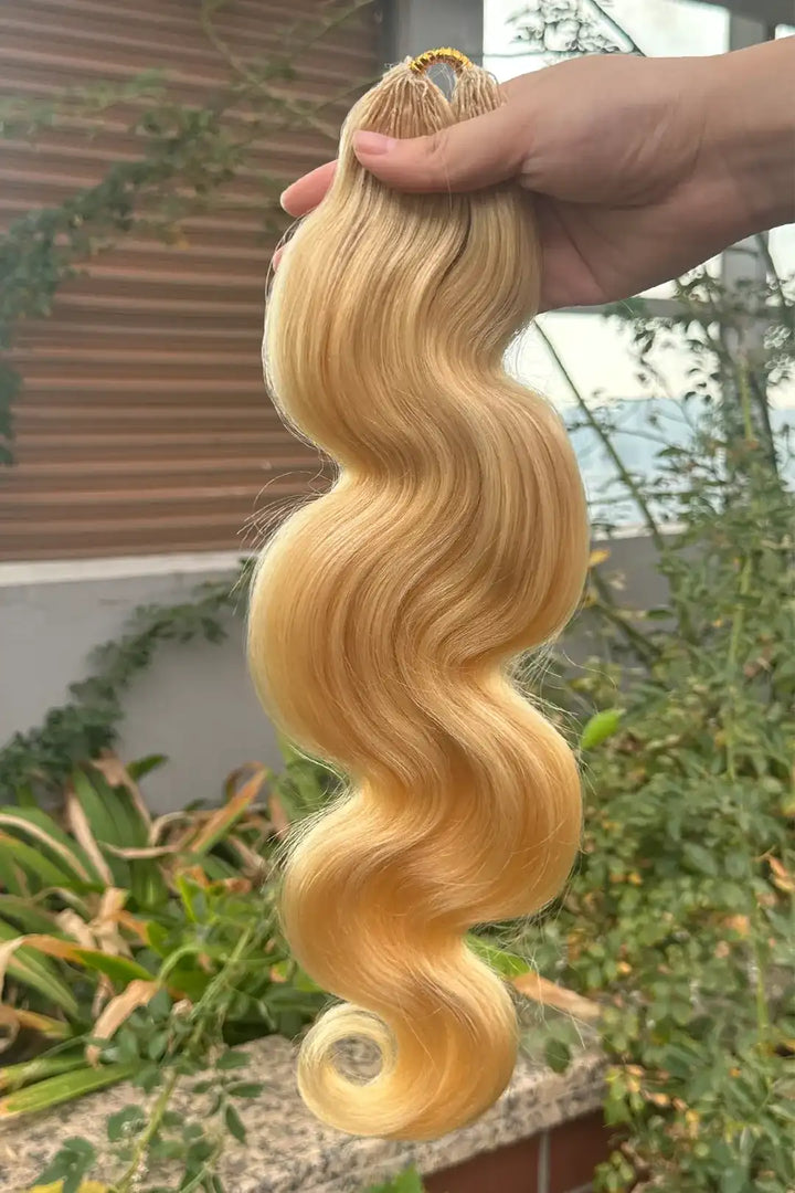 Outdoor picture of 613 blonde body wave feather crochet miracle knots human hair