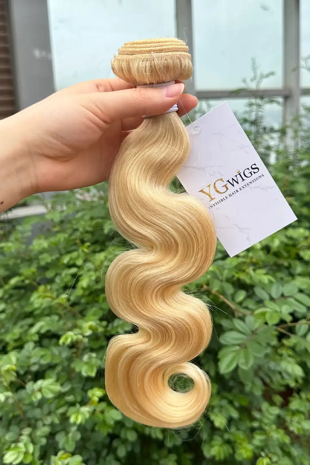 Outdoor picture of 613 blonde bundles sew in extensions body wave brazilian hair