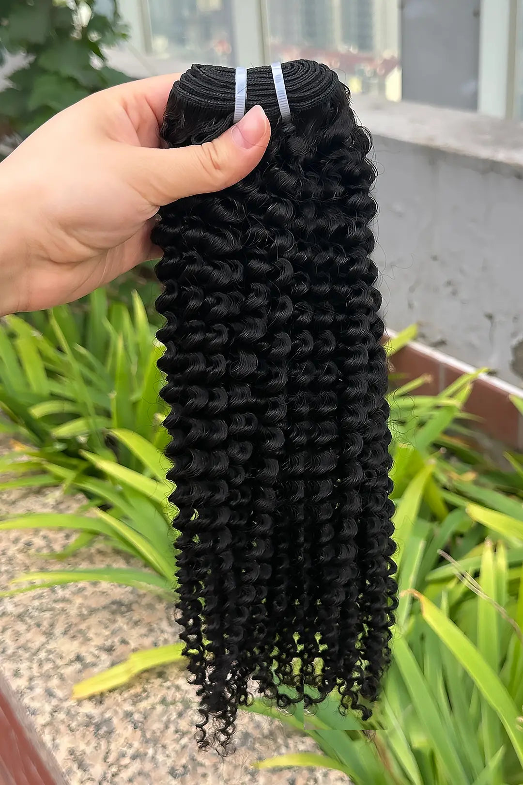 Outdoor picture of cambodia virgin hair bundles kinky curly
