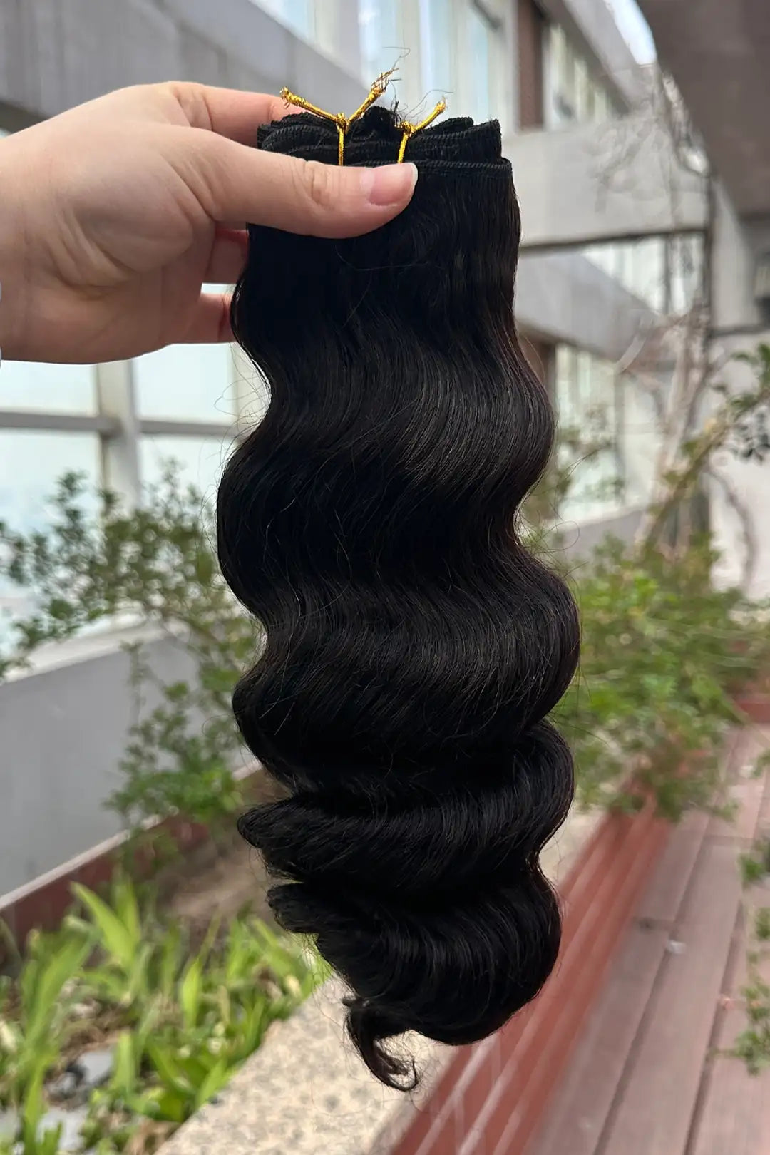 Outdoor picture of cambodia virgin hair bundles sew in extensions loose wave