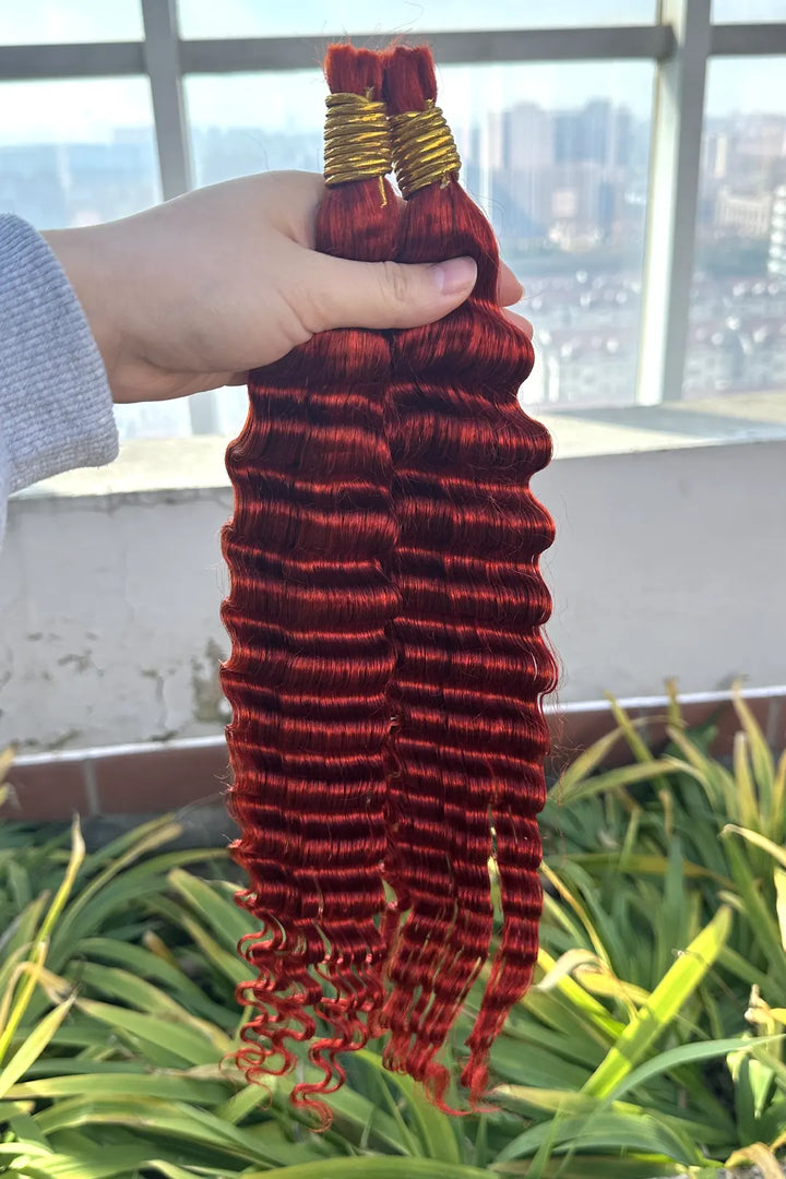 Outdoor picture of copper red deep wave bulk human hair for braiding bu23