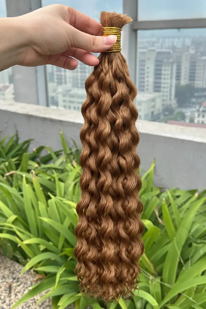 Outdoor picture of double drawn light auburn 30a color water wave bulk hair bu44