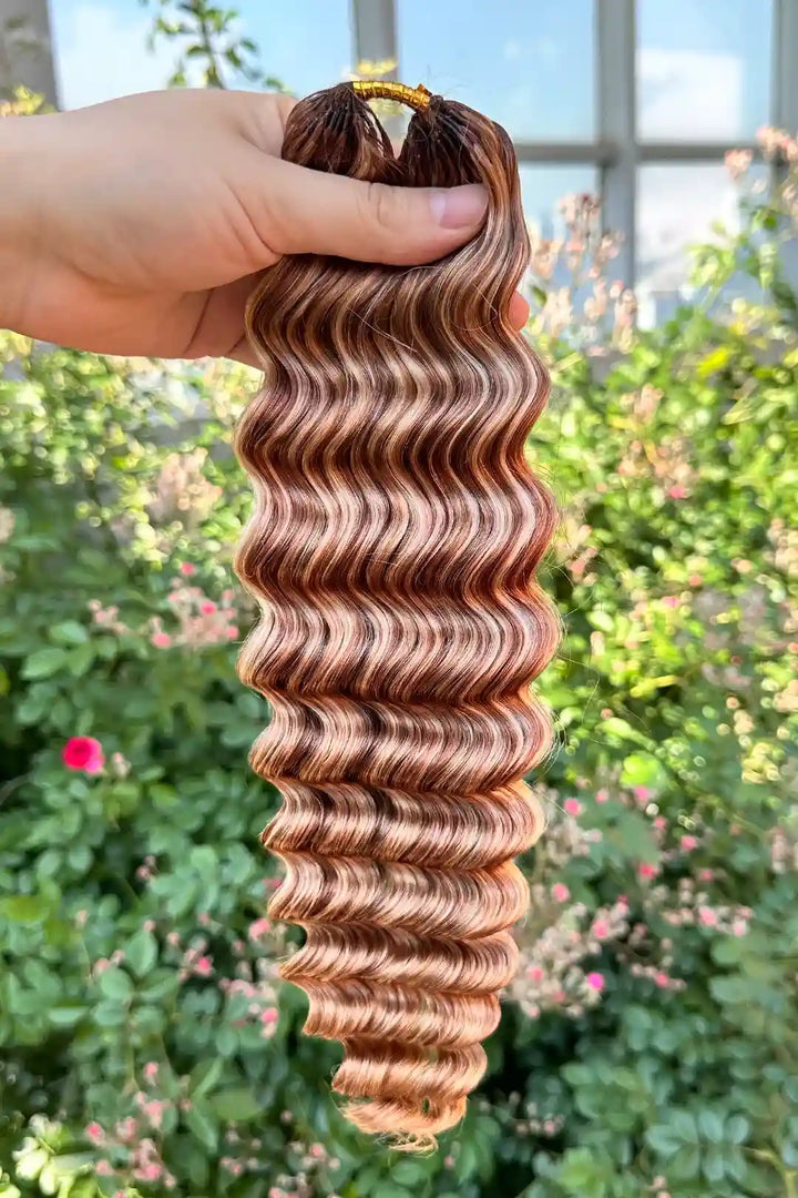 Outdoor picture of highlight blend #27/30/613 deep wave feather crochet human hair