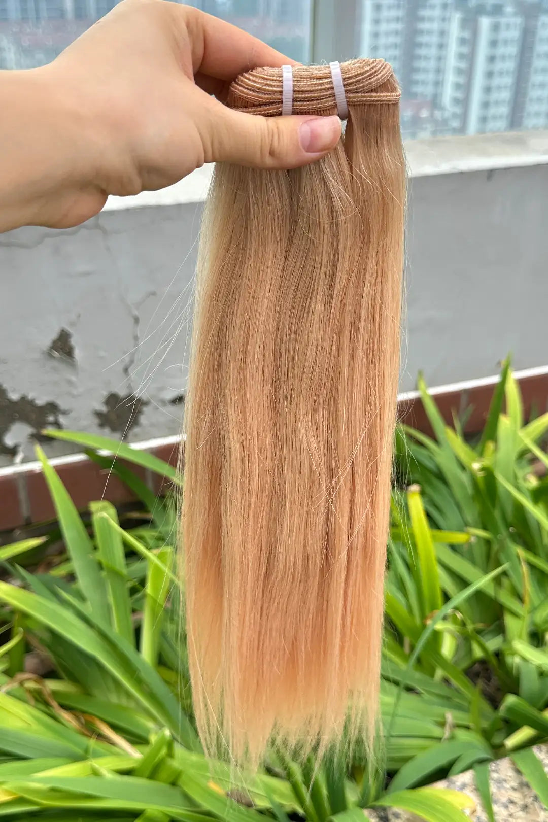 Outdoor picture of platinum blonde bundles #60a sew-in extensions straight virgin hair