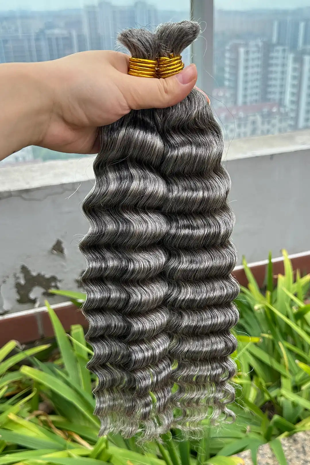 Outdoor picture of salt and pepper bulk hair deep wave 70% gray bu32