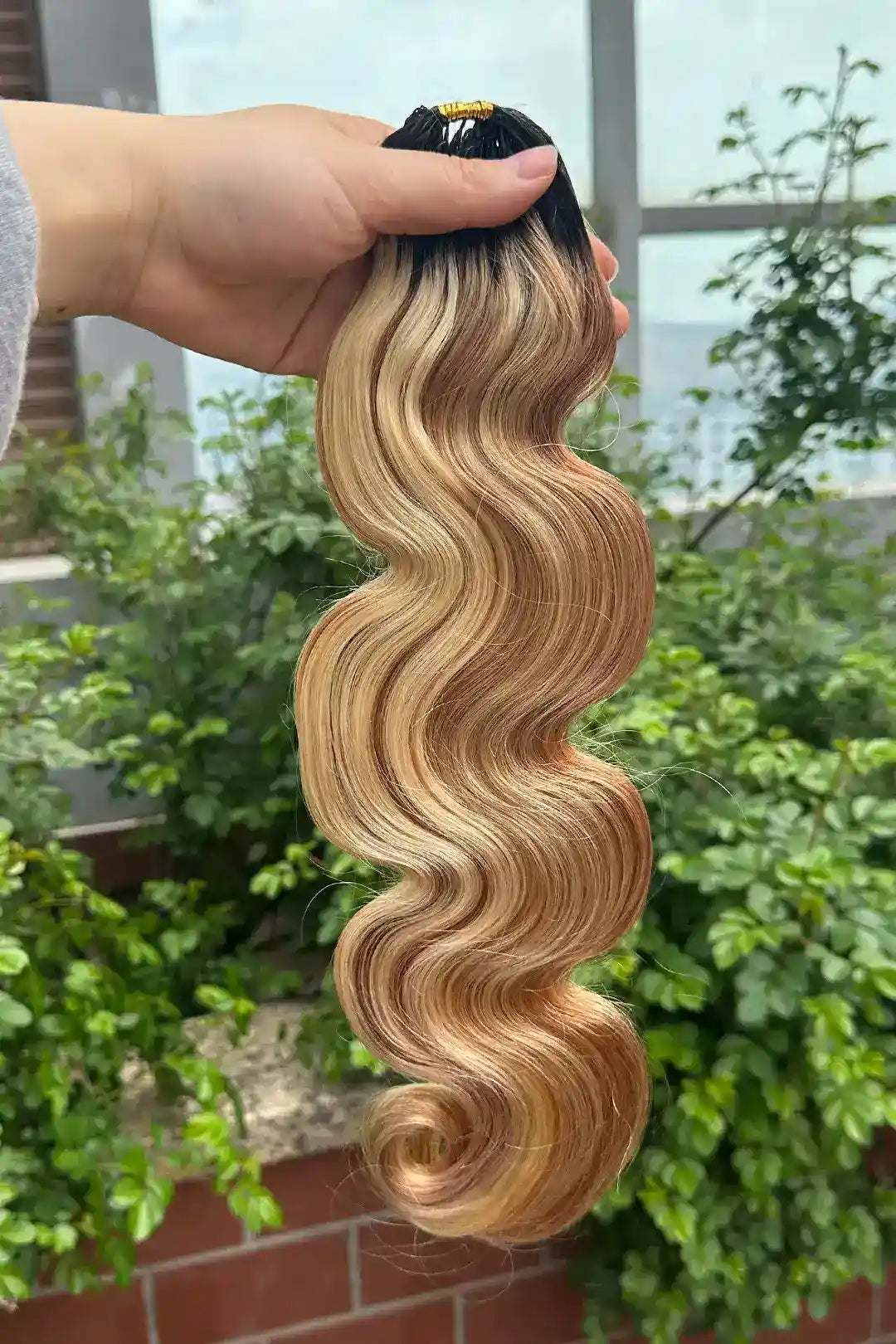 Outdoor picture of t natural black mixed 27/30/613 body wave feather crochet for miracle knots