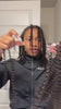 Tiktok influencer jairesemaj shows the braiding process of afro kinky curly feather crochet hair extension