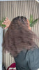 Tiktok influencer ladyy.chaa shows the braiding process of t1b/4 ombre color tight curly feather crochet hair extension