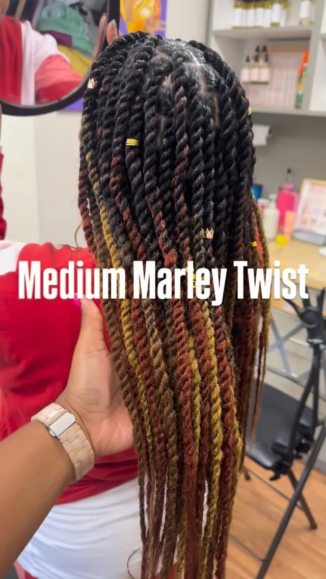 Medium Marley twists with brown highlights, hairstylist in Durham, NC
