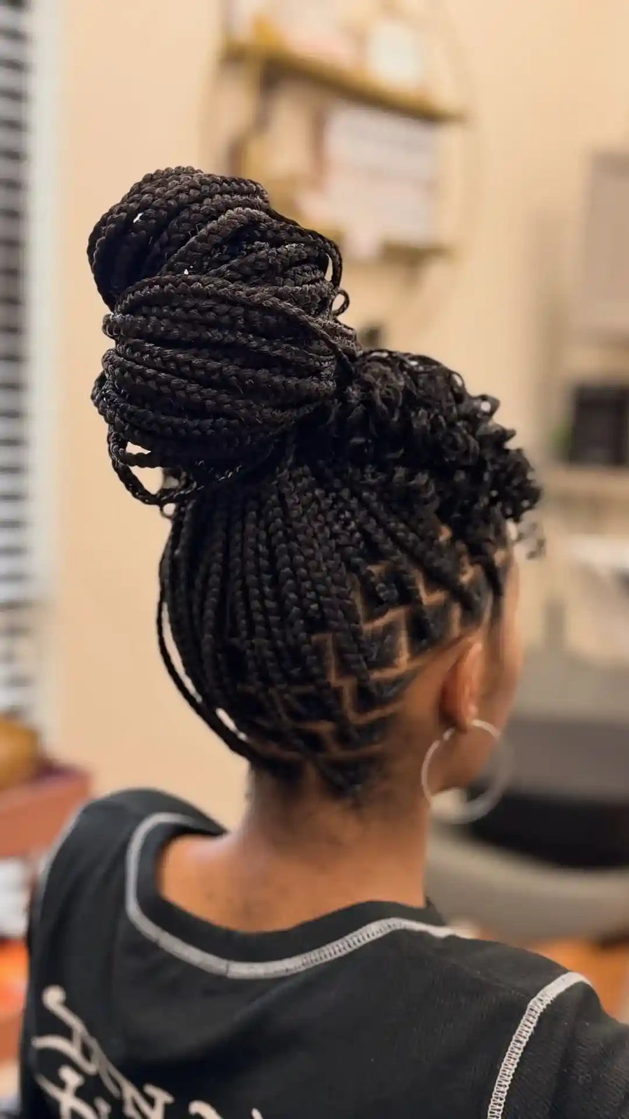 Stitch braids with clean parting and ponytail style, hairstylist in Durham, NC