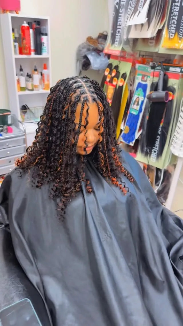 Medium Marley twists with curly ends, hairstylist in Durham, NC