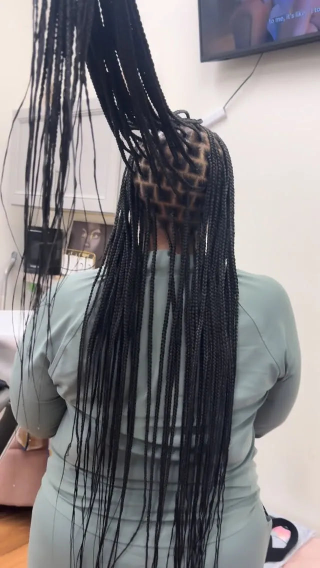Long knotless braids with clean square parting, hairstylist in Durham, NC