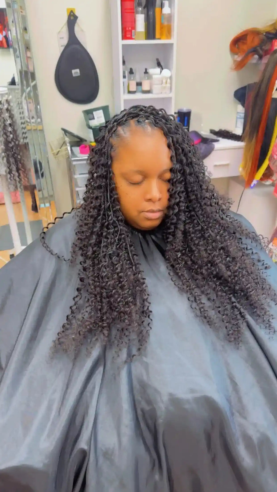 Feed-in braids with curly ends and laid edges, hairstylist in Durham, NC