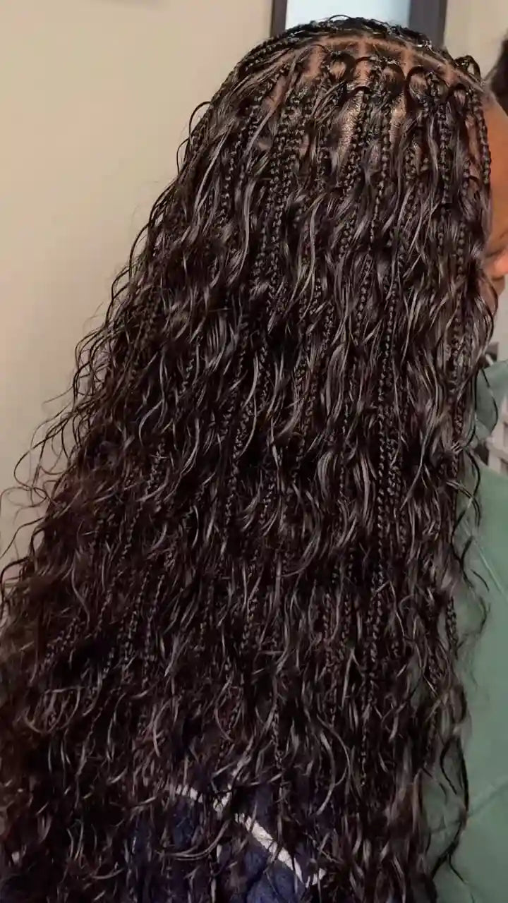 Long black boho braids with loose wet and wavy curls, hairstylist in San Antonio, TX
