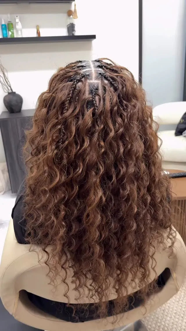Brown curly boho braids with clean top parting, hairstylist in San Antonio, TX