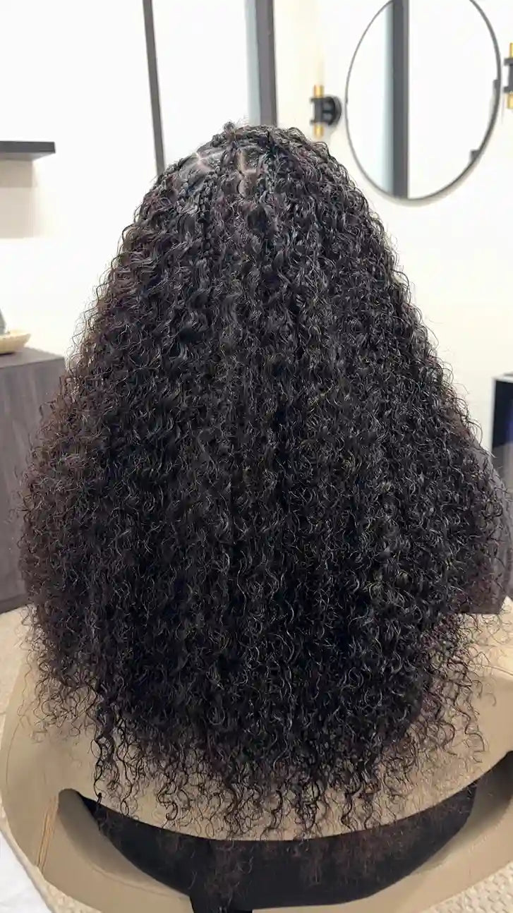 Full black curly boho braids from the back, hairstylist in San Antonio, TX