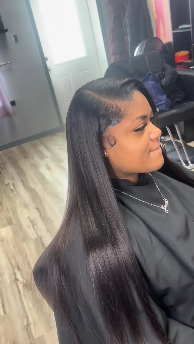 Sleek long straight silk press with side part, hairstylist in Westland, MI