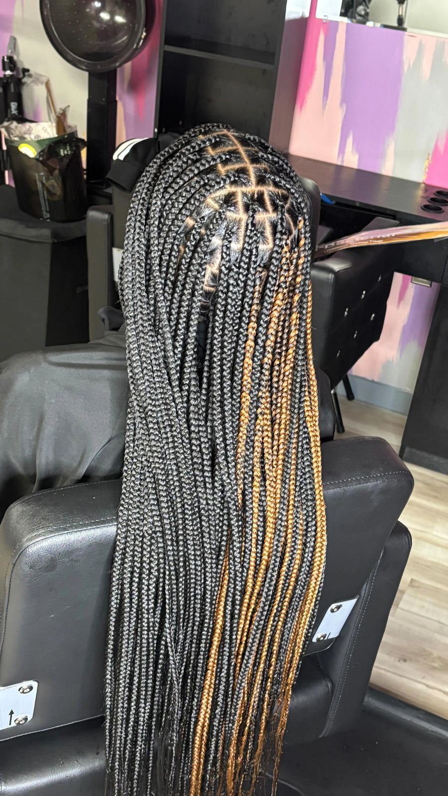 Long knotless box braids with black and honey blonde color blend, hairstylist in Westland, MI