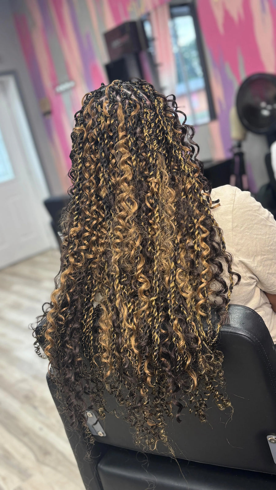 Long boho knotless braids with blonde curly highlights, hairstylist in Westland, MI