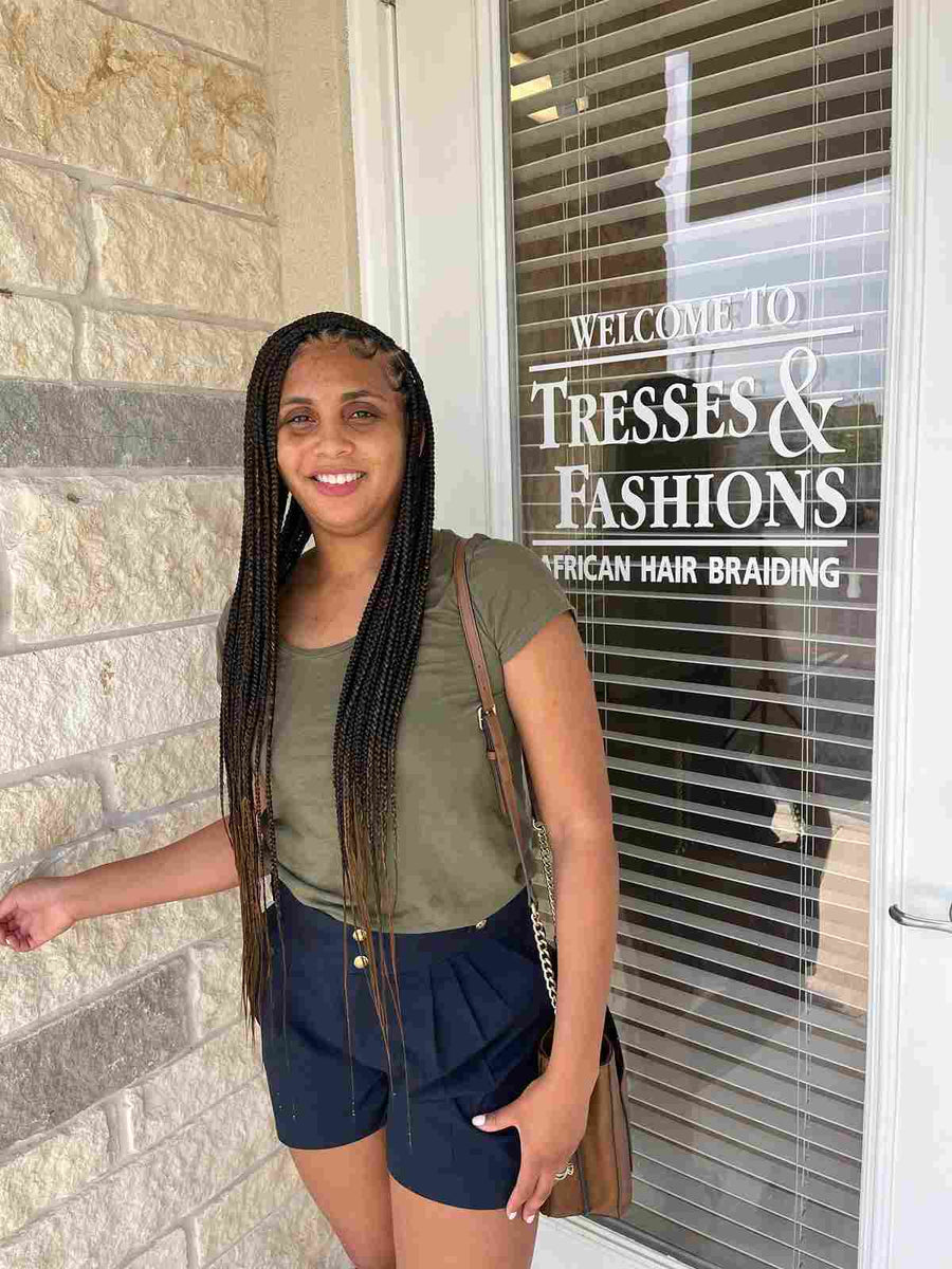 Long small knotless braids with natural black color, hairstylist located in Round Rock, TX