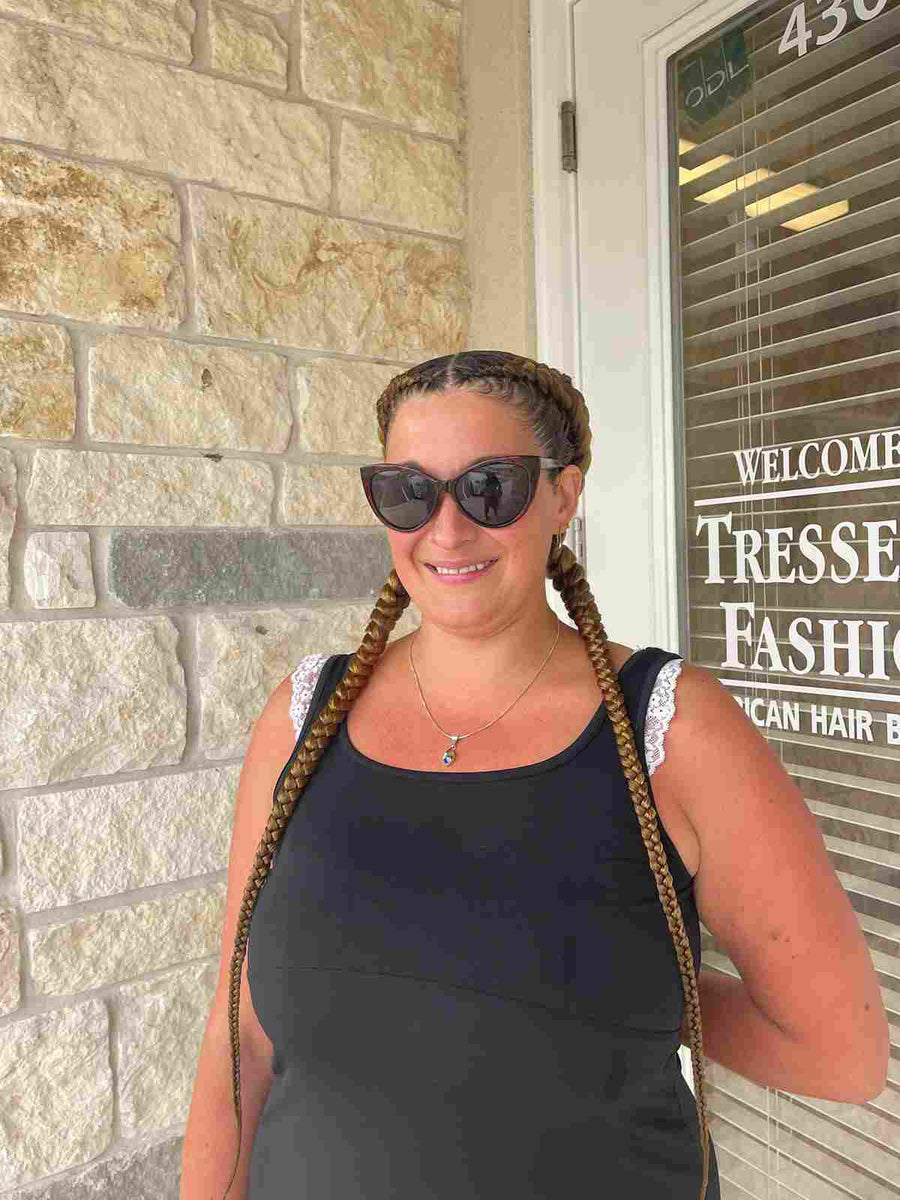 Two feed-in braids with ombre brown extensions, hairstylist located in Round Rock, TX