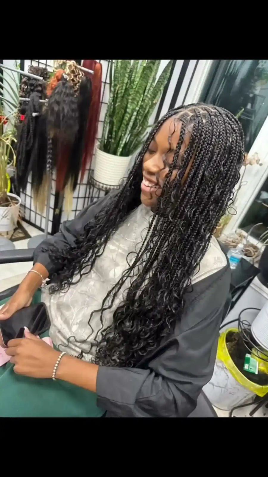 Small box braids with curled ends, Stylist located in Chicago, IL