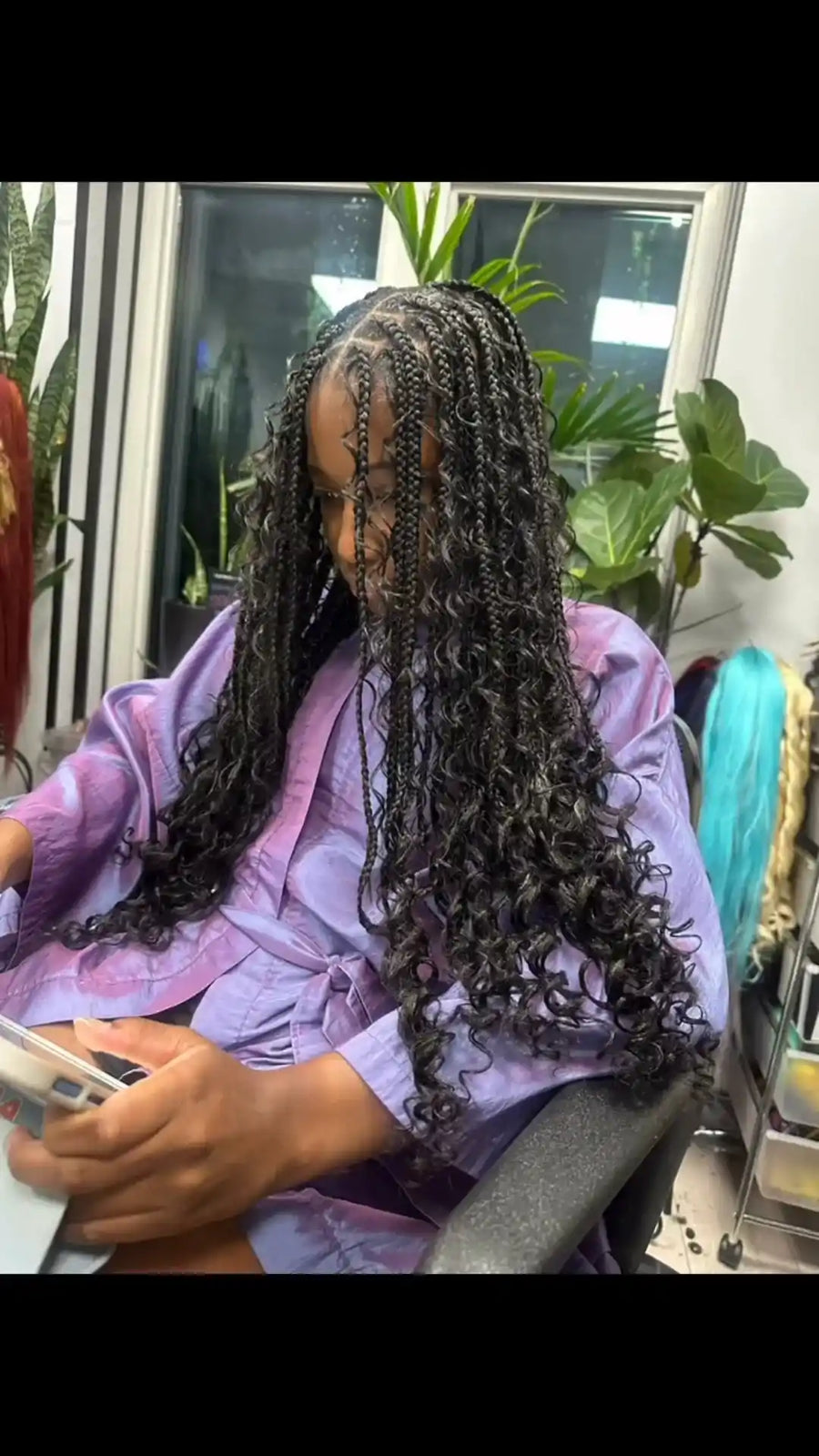 Kids box braids with colorful beads and curled ends, Stylist located in Chicago, IL