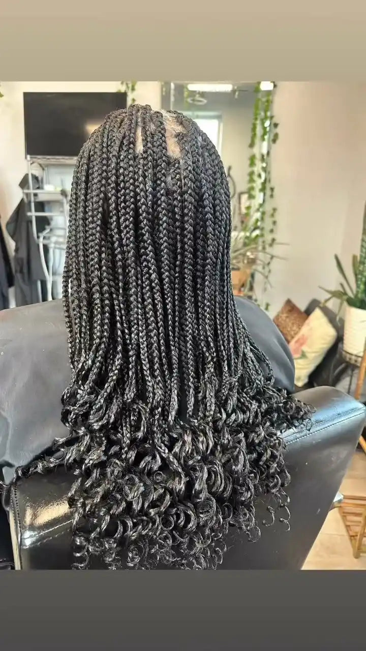 1. Medium box braids with curled ends, Stylist located in Chicago, IL