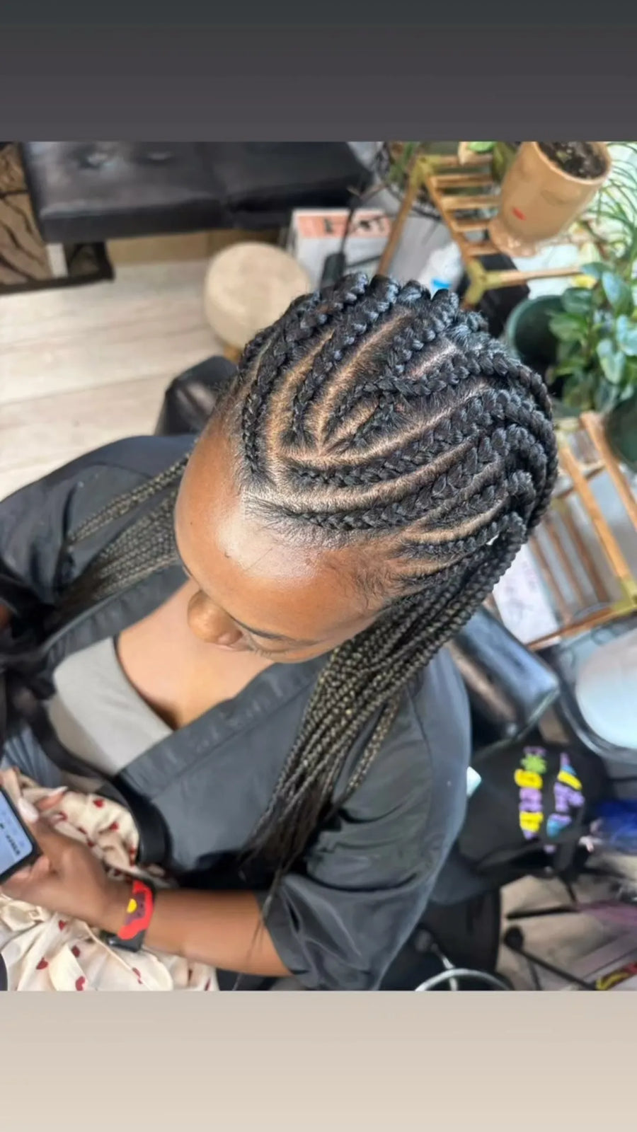 Stitch feed-in braids with side-swept parting, Stylist located in Chicago, IL