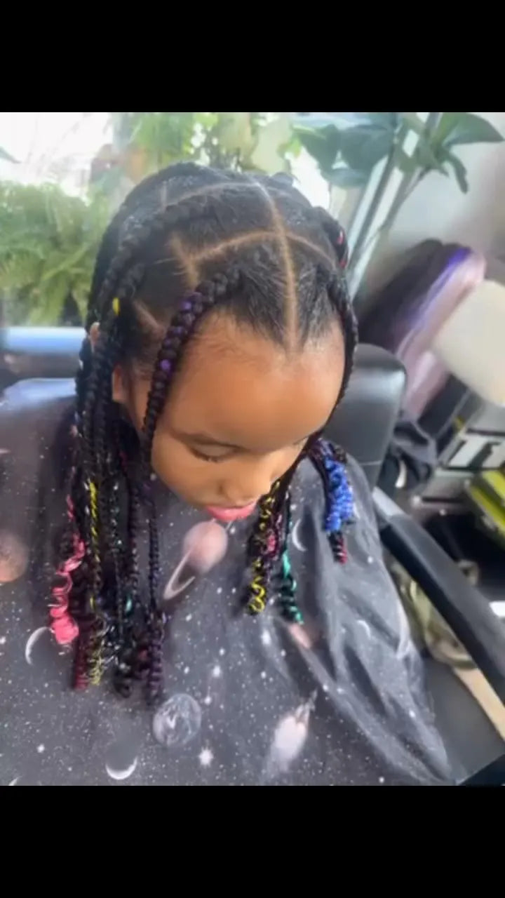 Kids box braids with colorful accent braids, Stylist located in Chicago, IL