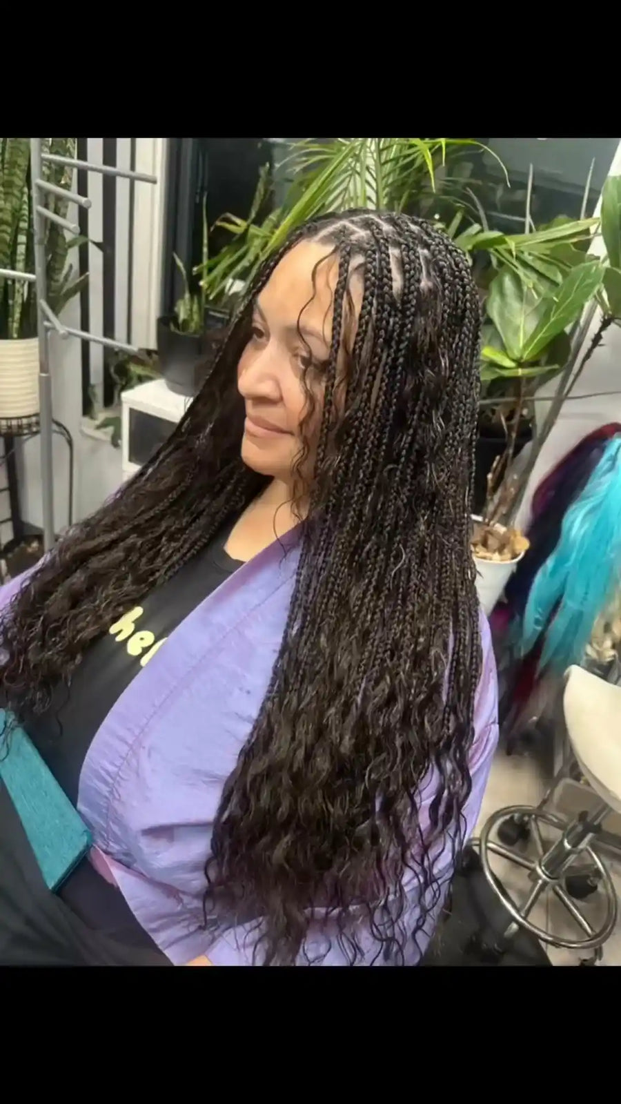 Boho knotless braids with loose curly texture, Stylist located in Chicago, IL