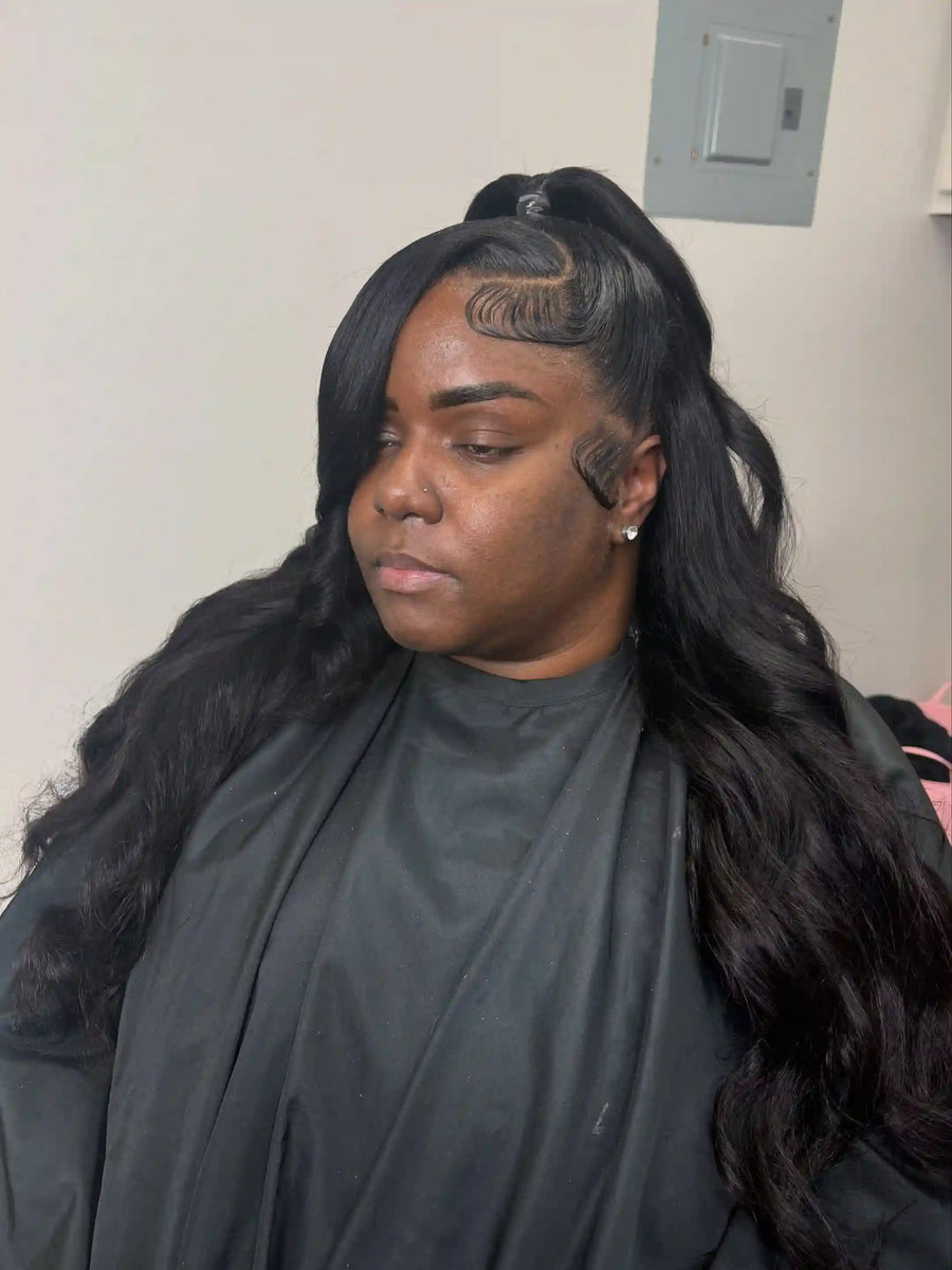 Black half up half down body wave wig style with swoop edges, Stylist located in Jacksonville, FL