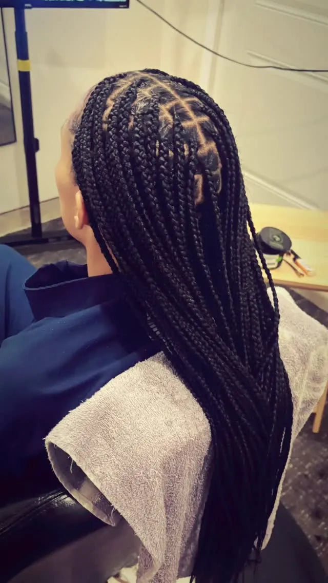 Long box braids with clean parting protective hairstyle, hairstylist in Dover, DE