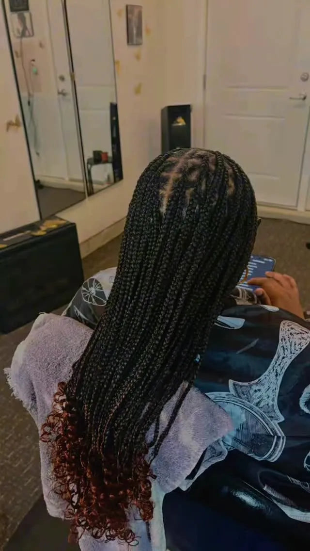 Long box braids with curly ends protective style, hairstylist in Dover, DE