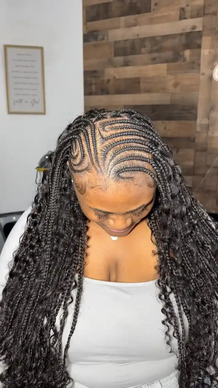 Long Fulani braids with curved feed-in cornrows and loose curly extensions, hairstylist located in Fort Lauderdale, FL