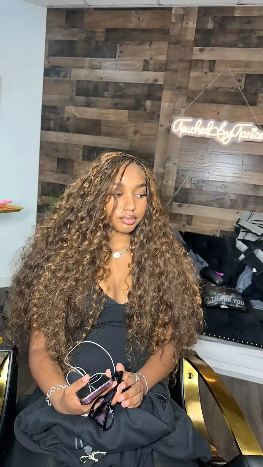 Extra-long small knotless box braids with clean square parting and a sleek finish, hairstylist located in Fort Lauderdale, FL