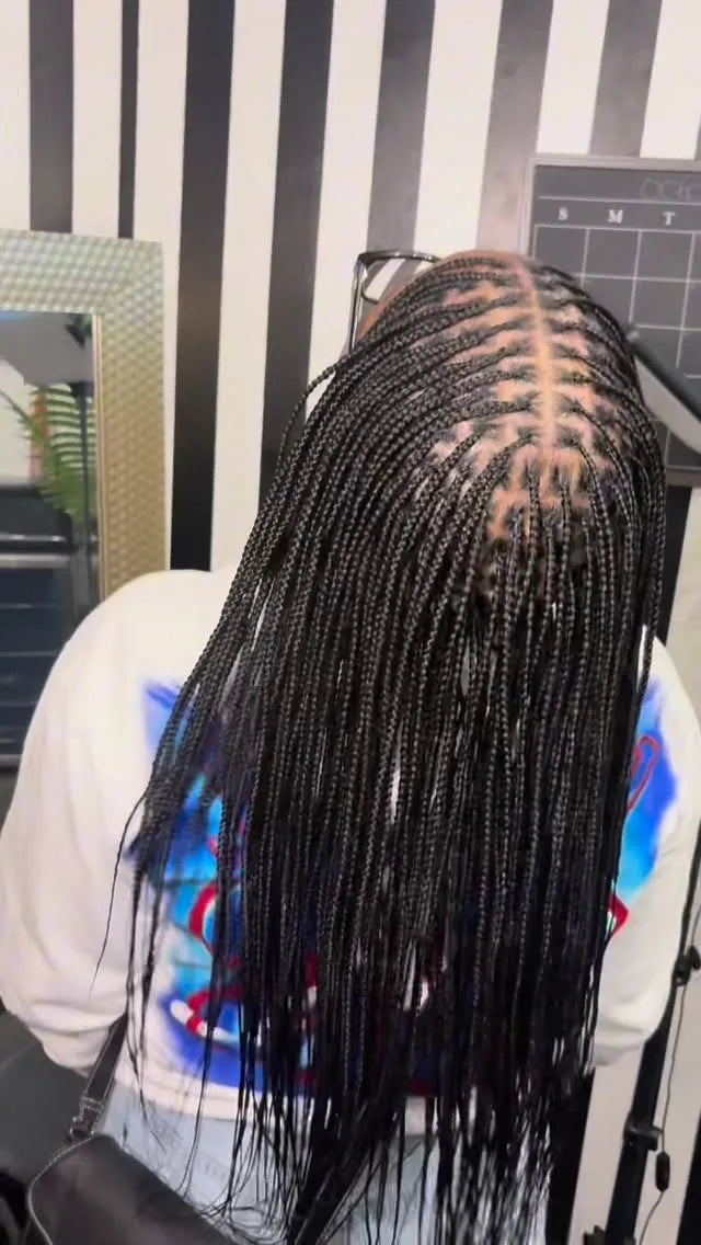 Long small knotless braids with clean square parting, hairstylist in Dallas, TX