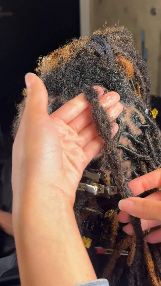 Natural loc maintenance and retwist in progress, hairstylist in Dallas, TX