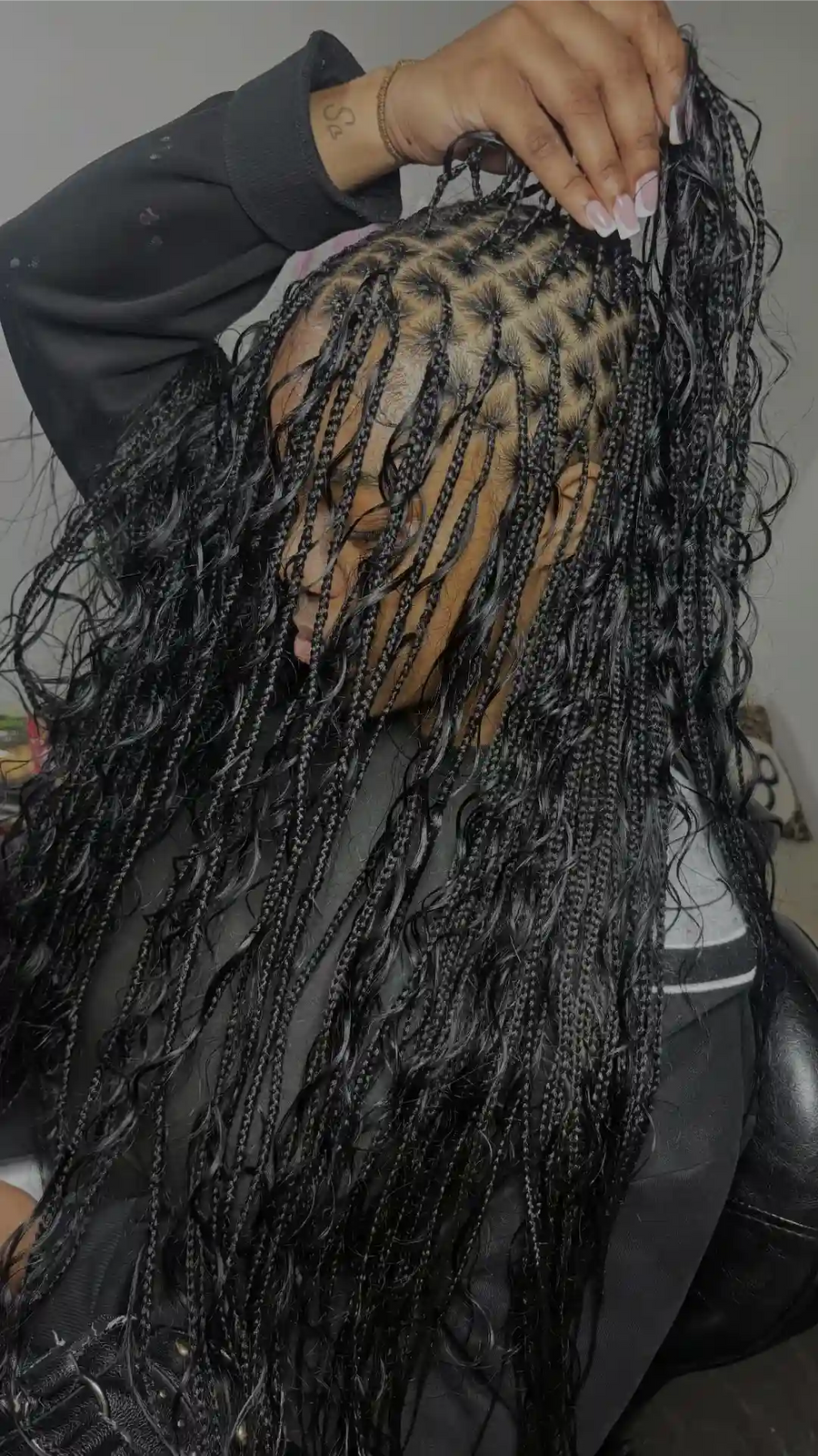 Boho knotless braids with wet and wavy curly pieces, hairstylist in Dallas, TX