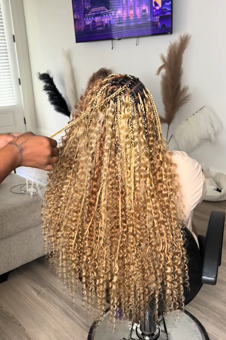 Tiktok influencer braidwinners__llc shows the braiding process of 27/30/613 piano color deep wave bulk hair