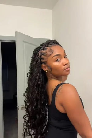 Tiktok influencer ericadondada shows the braiding process of body wave braiding feather crochet hair