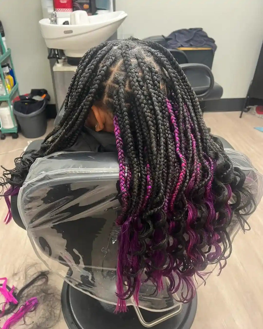 Knotless braids with magenta highlights and curled ends, Stylist located in Voorhees, NJ