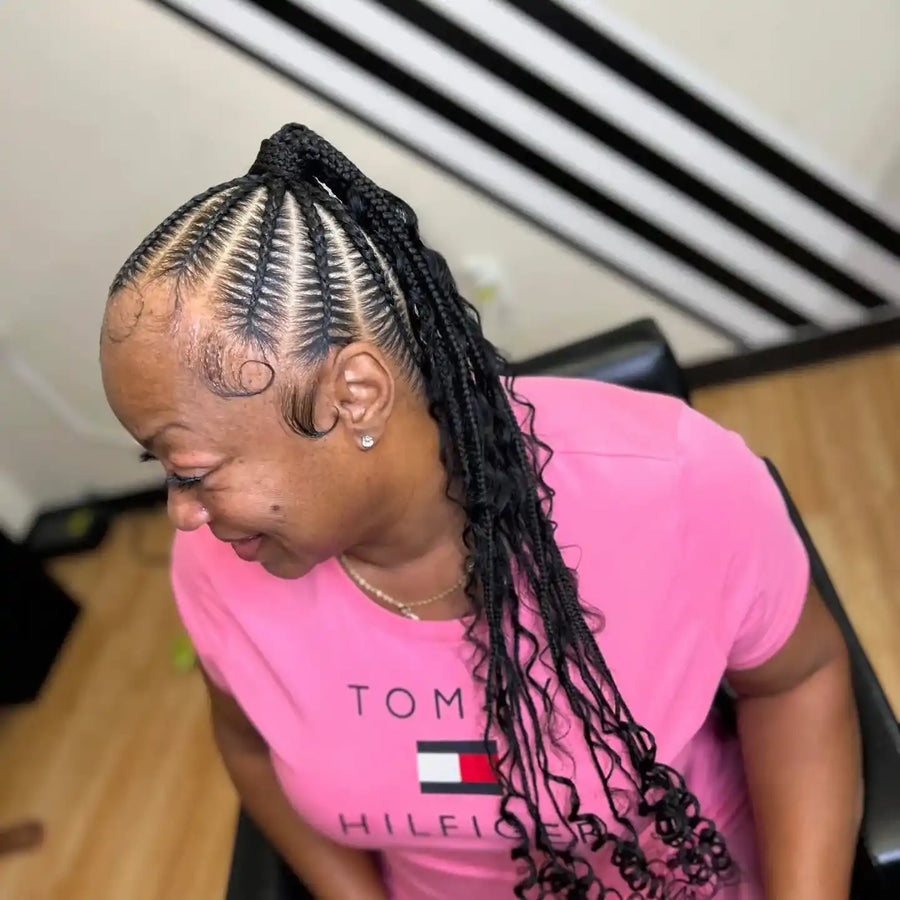 Kids long feed-in braids with curled ends, hairstylist in College Station, TX