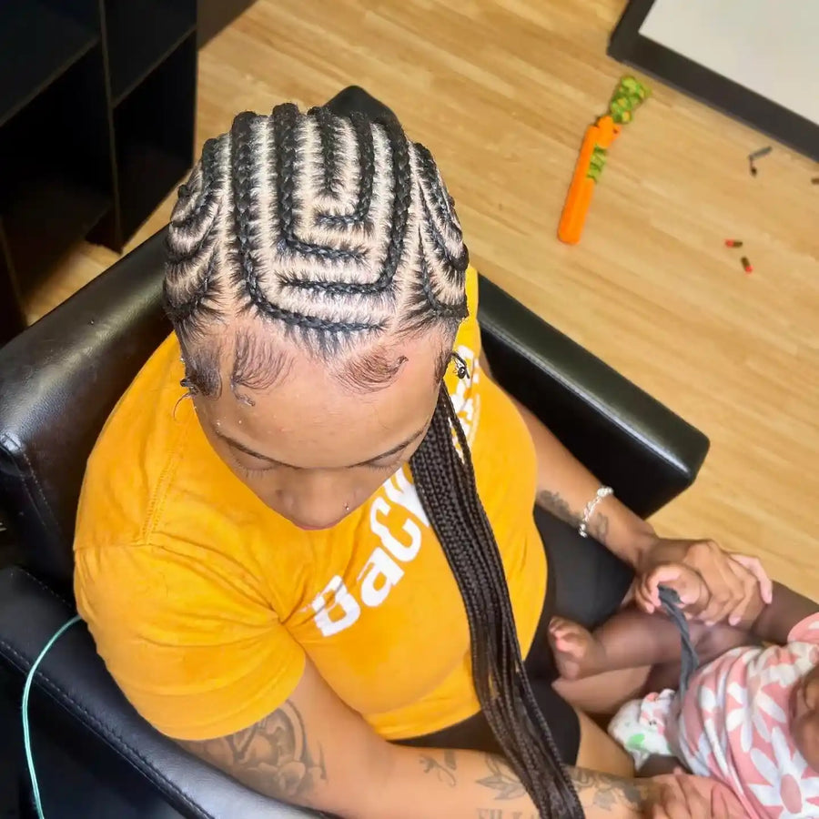 Kids box braids with bow and curly ends, hairstylist in College Station, TX
