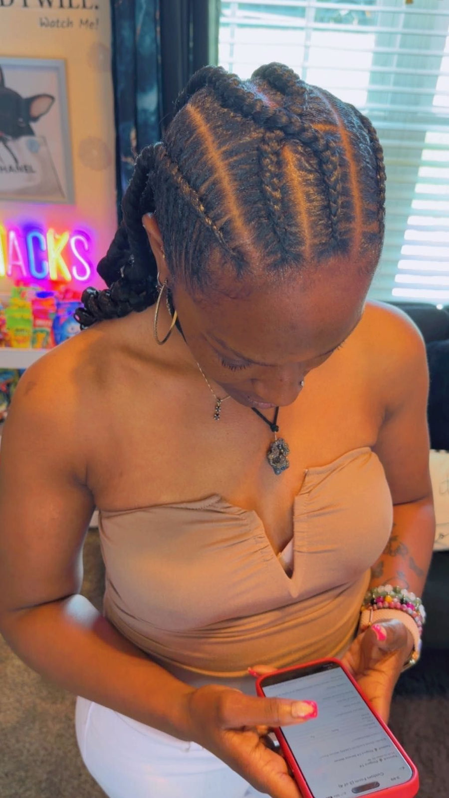 Feed-in stitch braids with clean side parting and low braided ponytail, hairstylist in Texas City, TX