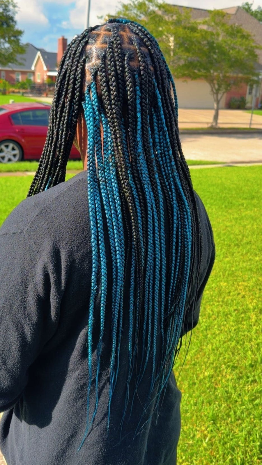 Long black and blue box braids with clean square parts, hairstylist in Texas City, TX